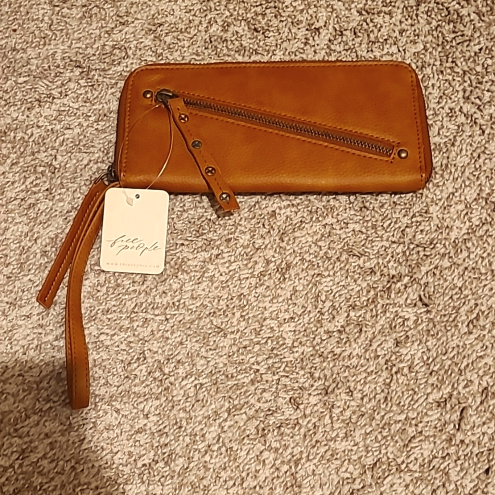 Free People tan wallet/clutch with zipper & stud details